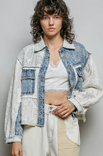 Load image into Gallery viewer, Person wearing a layered outfit with a denim jacket and white top against a plain background
